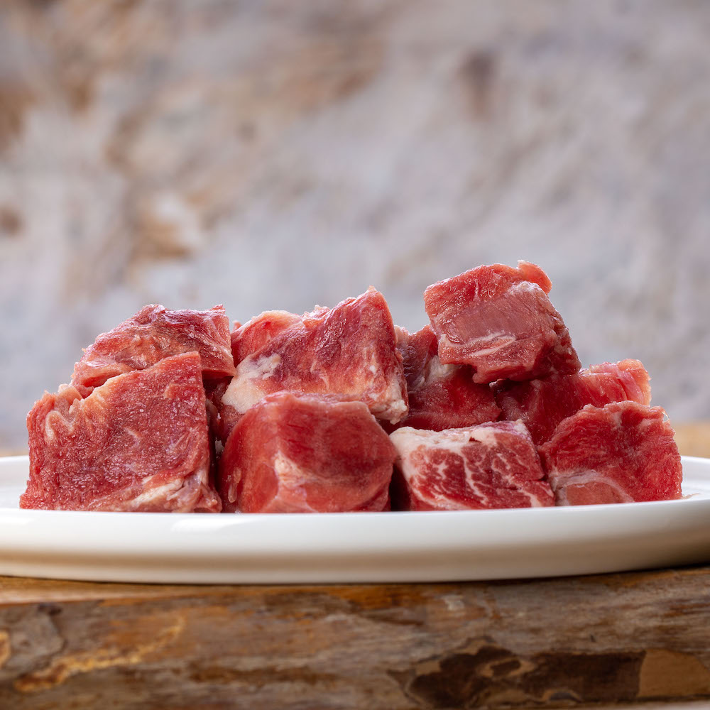 Barfgold Ziegenmuskelfleisch, durchwachsen gefroren, gewürfelt 1000g